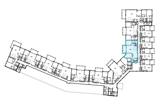 a kitchen with stainless steel appliances kitchen island granite countertop a refrigerator a stove a sink dishwasher with a dining table and chairs with wooden floor