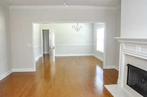 a view of livingroom and hardwood floor