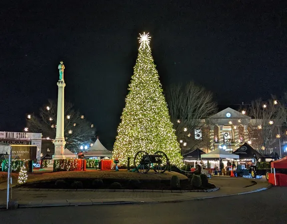 a large building with trees in the background
