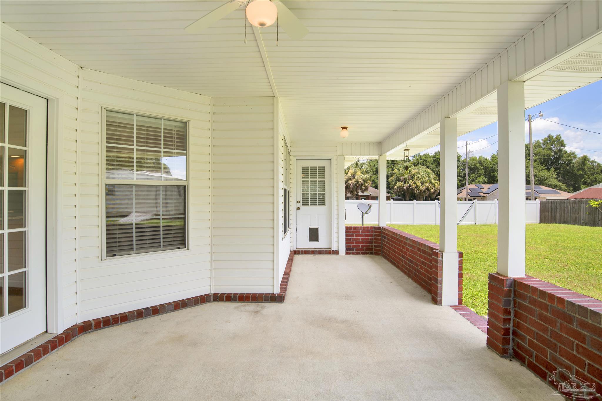 4420 Devonshire Place Pace, FL 32571 - Photo 25 of 35 a view of an empty room and window