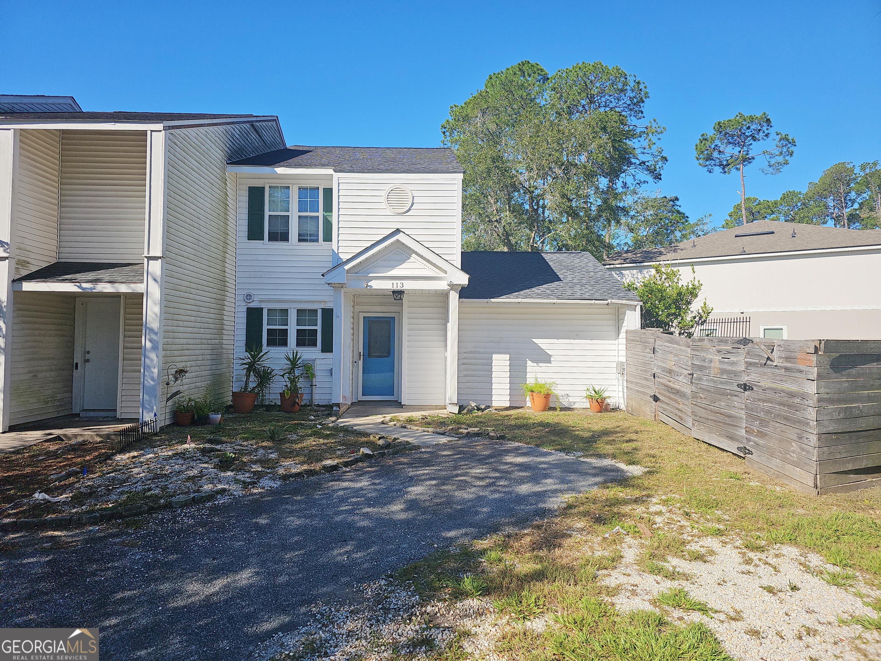 113 Inlet Reach Circle St. Marys, GA 31558 - Photo 18 of 18 a front view of a house with a yard