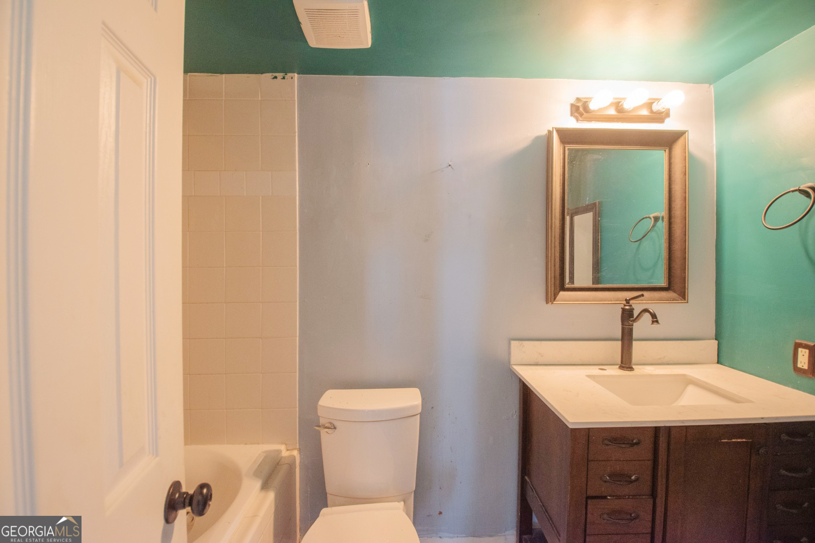 113 Inlet Reach Circle St. Marys, GA 31558 - Photo 7 of 18 a bathroom with a sink and a mirror