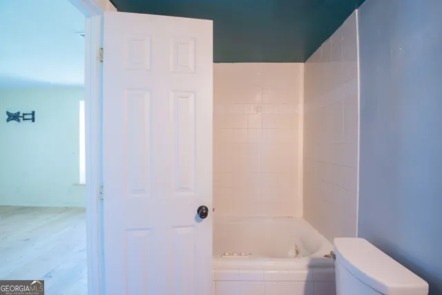 a bathroom with a bathtub