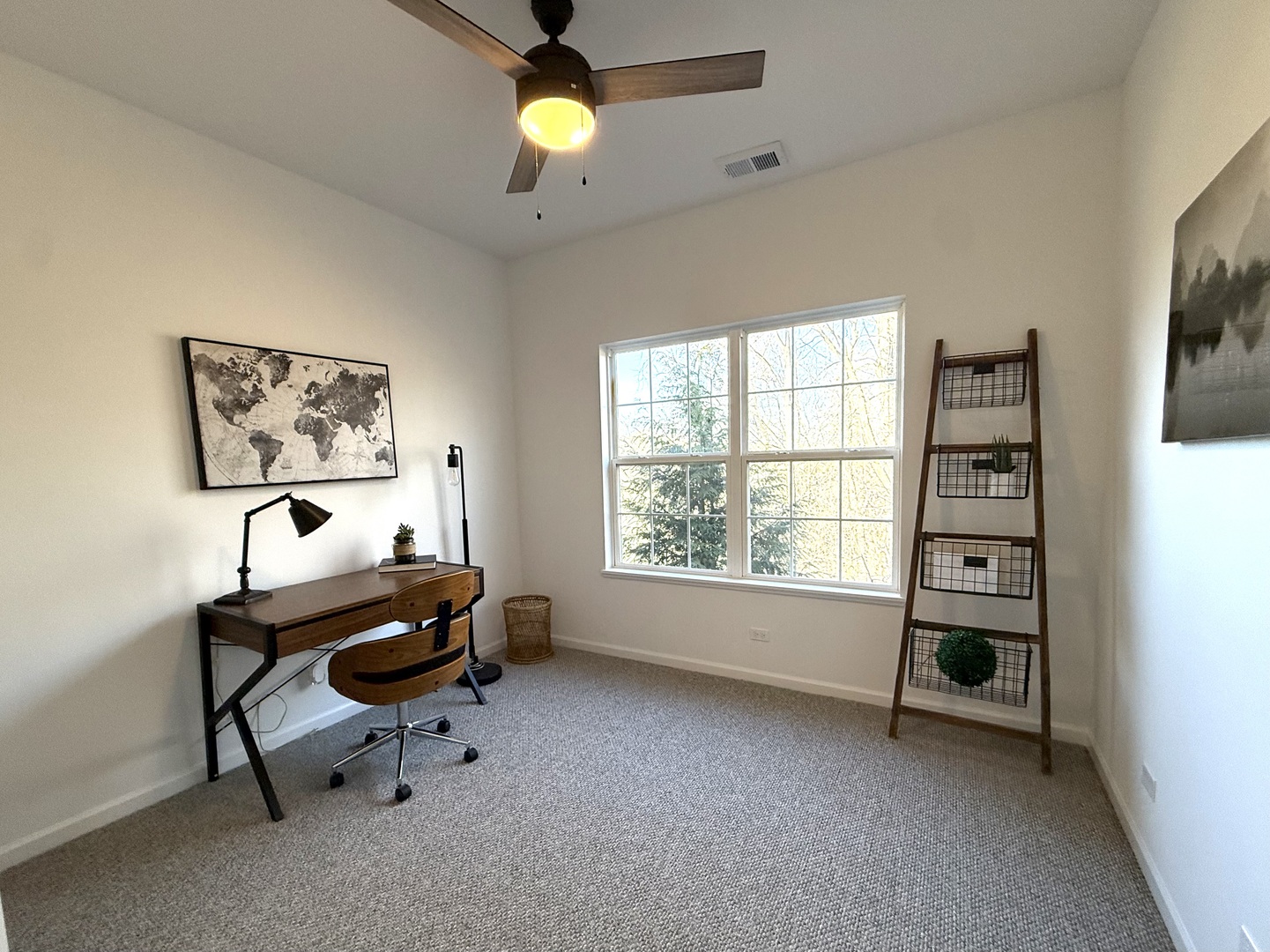 5293 Pebble Lane Crystal Lake, IL 60012 - Photo 16 of 17 a view of a workspace with furniture and a window