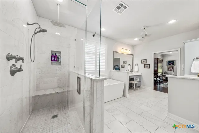 a view of a backyard with sitting area furniture and garden