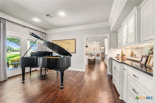 a workspace with furniture and window