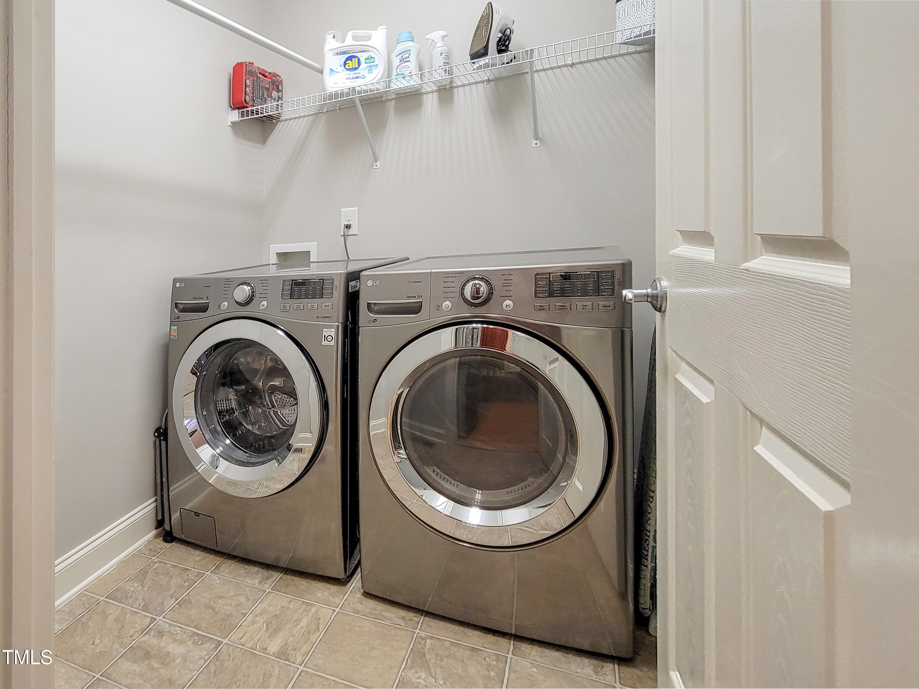 7502 Hedfield Way Durham, NC 27713 - Photo 26 of 28 a utility room with dryer and washer