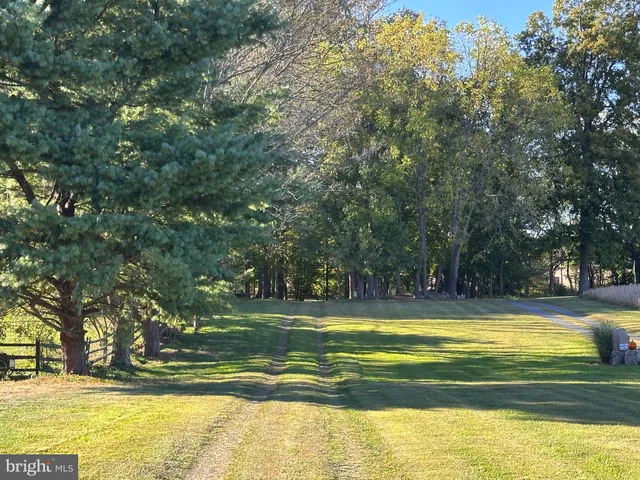 a view of swimming pool with outdoor seating