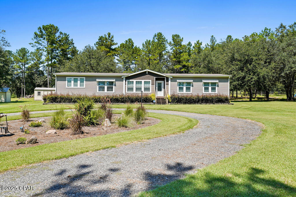 7910 Sneads Landing Road Sneads, FL 32460 - Photo 1 of 51