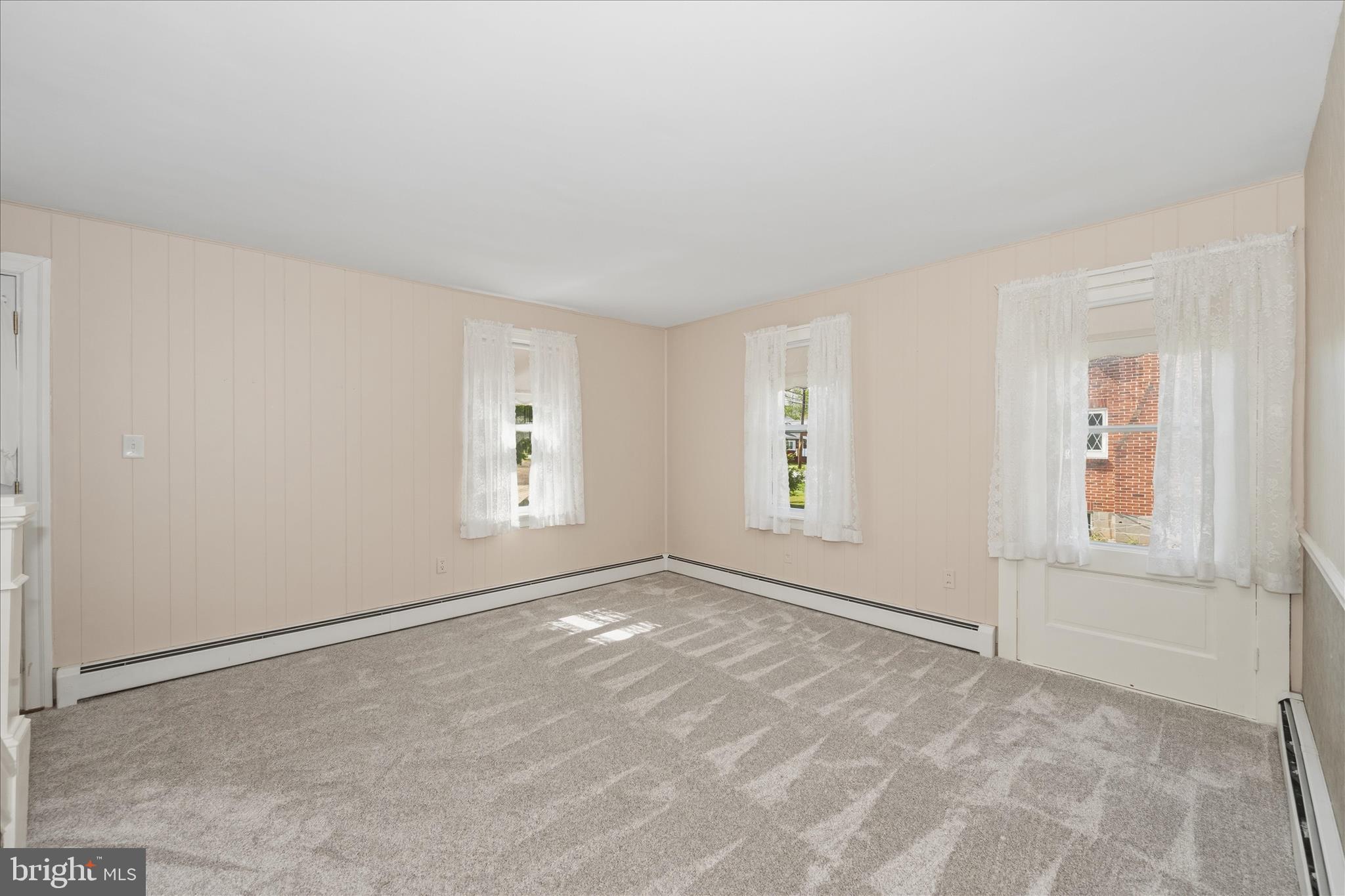 11205 Hessong Bridge Road Thurmont, MD 21788 - Photo 7 of 69 an empty room with windows