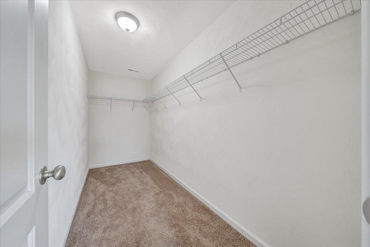 427 Cambridge Ct Road Vinton, VA 24179 - Photo 27 of 46 a view of a room with racks on the wall
