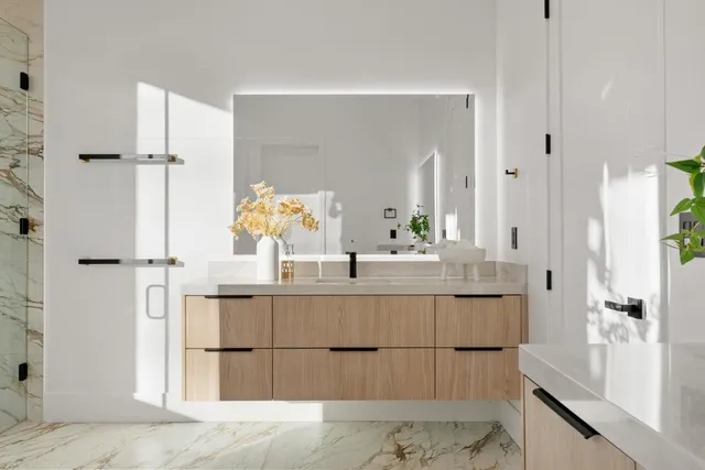 a kitchen with stainless steel appliances a sink and a stove top oven