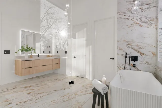 a living room with furniture kitchen view and a large window