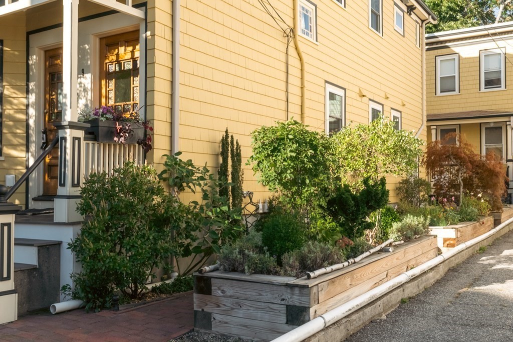 9 Joseph Street, Unit 1 Somerville, MA 02143 - Photo 13 of 17 a view of house with a small garden