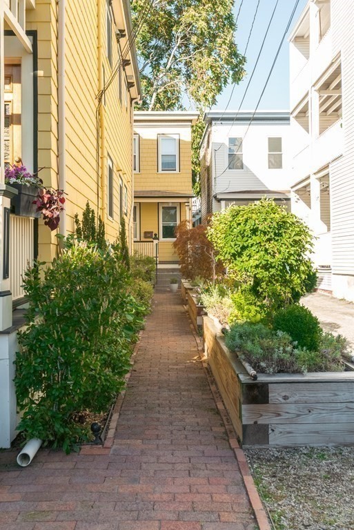 9 Joseph Street, Unit 1 Somerville, MA 02143 - Photo 14 of 17 a view of a back yard of the house