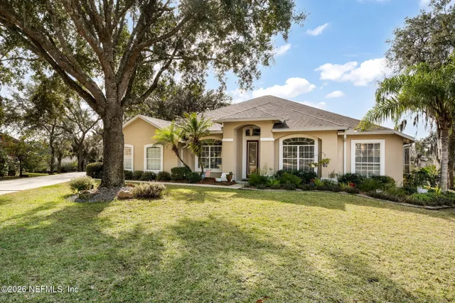 an aerial view of residential house with outdoor space