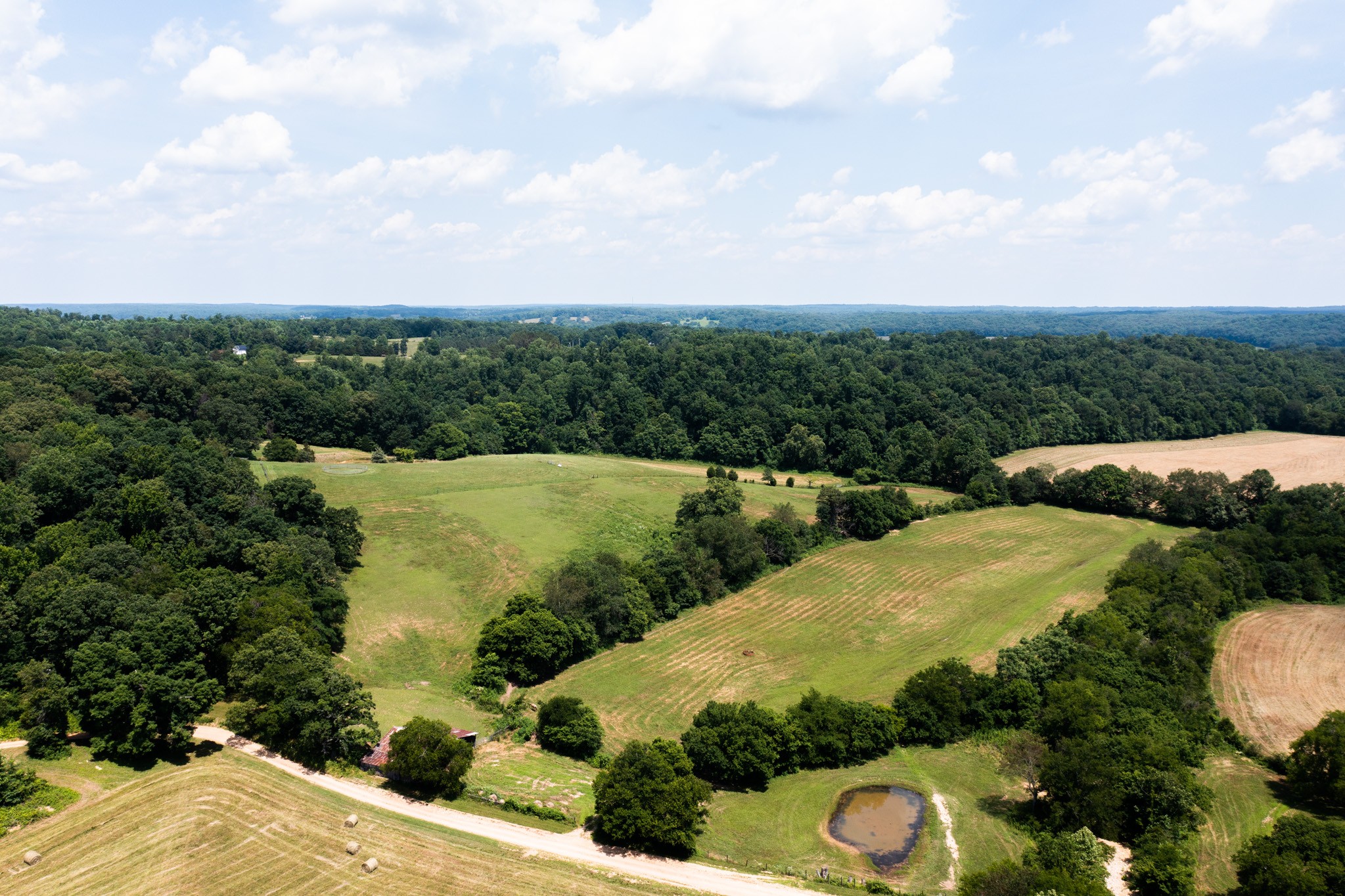 2895 South Possum Hollow Road Nunnelly, TN 37137 - Photo 11 of 25 a view of a lake with a yard