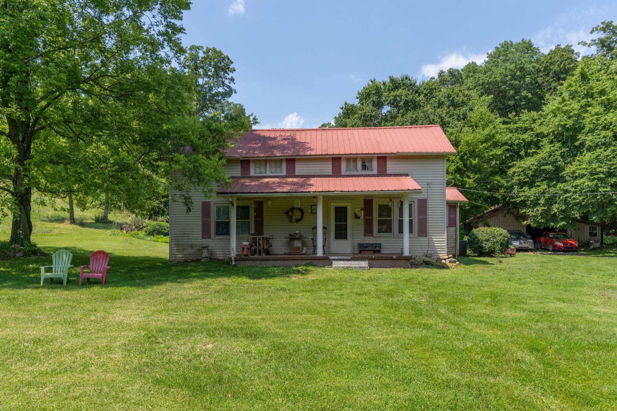 2895 South Possum Hollow Road Nunnelly, TN 37137 - Photo 13 of 25 a view of a house with a yard and sitting area