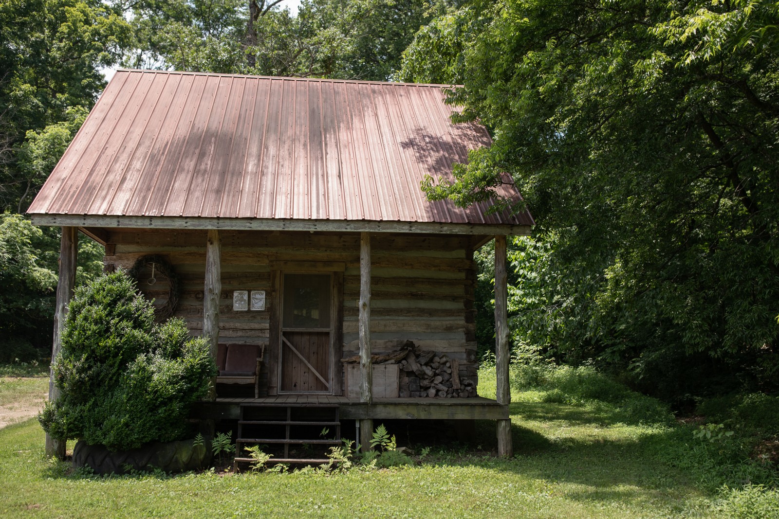 2895 South Possum Hollow Road Nunnelly, TN 37137 - Photo 3 of 25 a view of house with backyard outdoor seating and plants