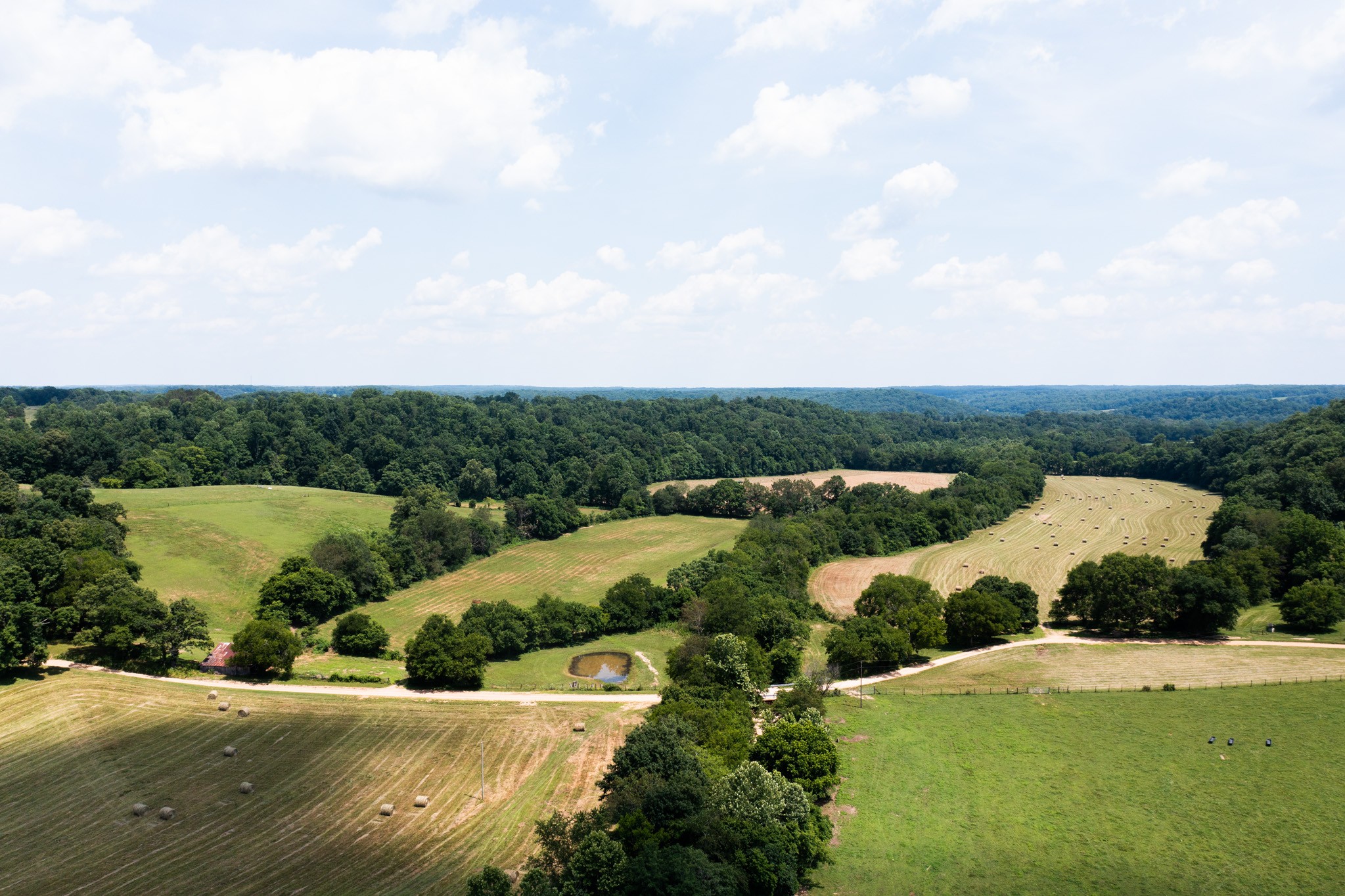 2895 South Possum Hollow Road Nunnelly, TN 37137 - Photo 10 of 25 an aerial view of a houses with outdoor space