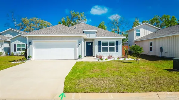 a view of a house with swimming pool