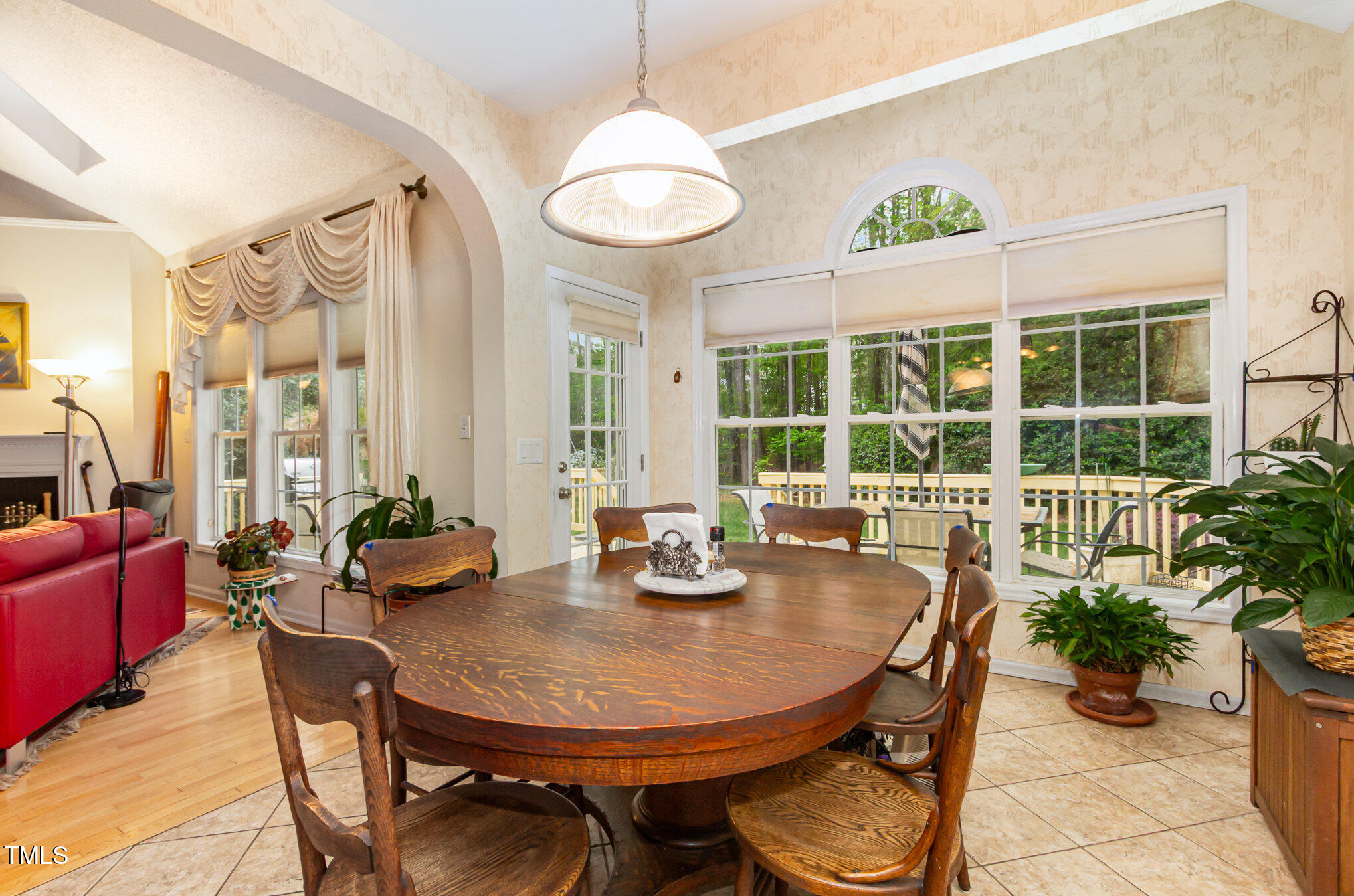 401 Stinhurst Drive Durham, NC 27713 - Photo 11 of 39 a view of a dining room with furniture window and outside view