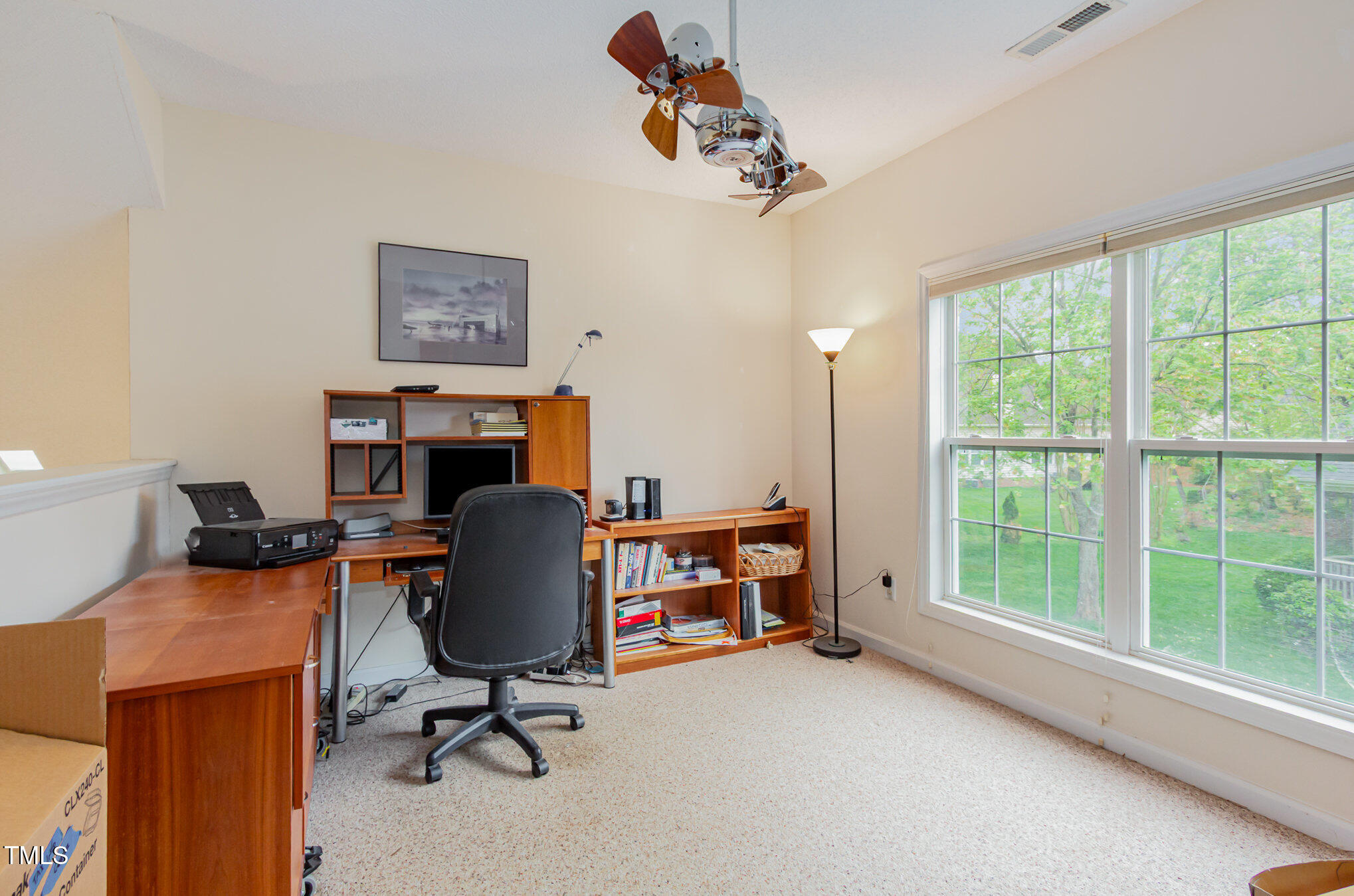 401 Stinhurst Drive Durham, NC 27713 - Photo 28 of 39 a view of a workspace with furniture and a window