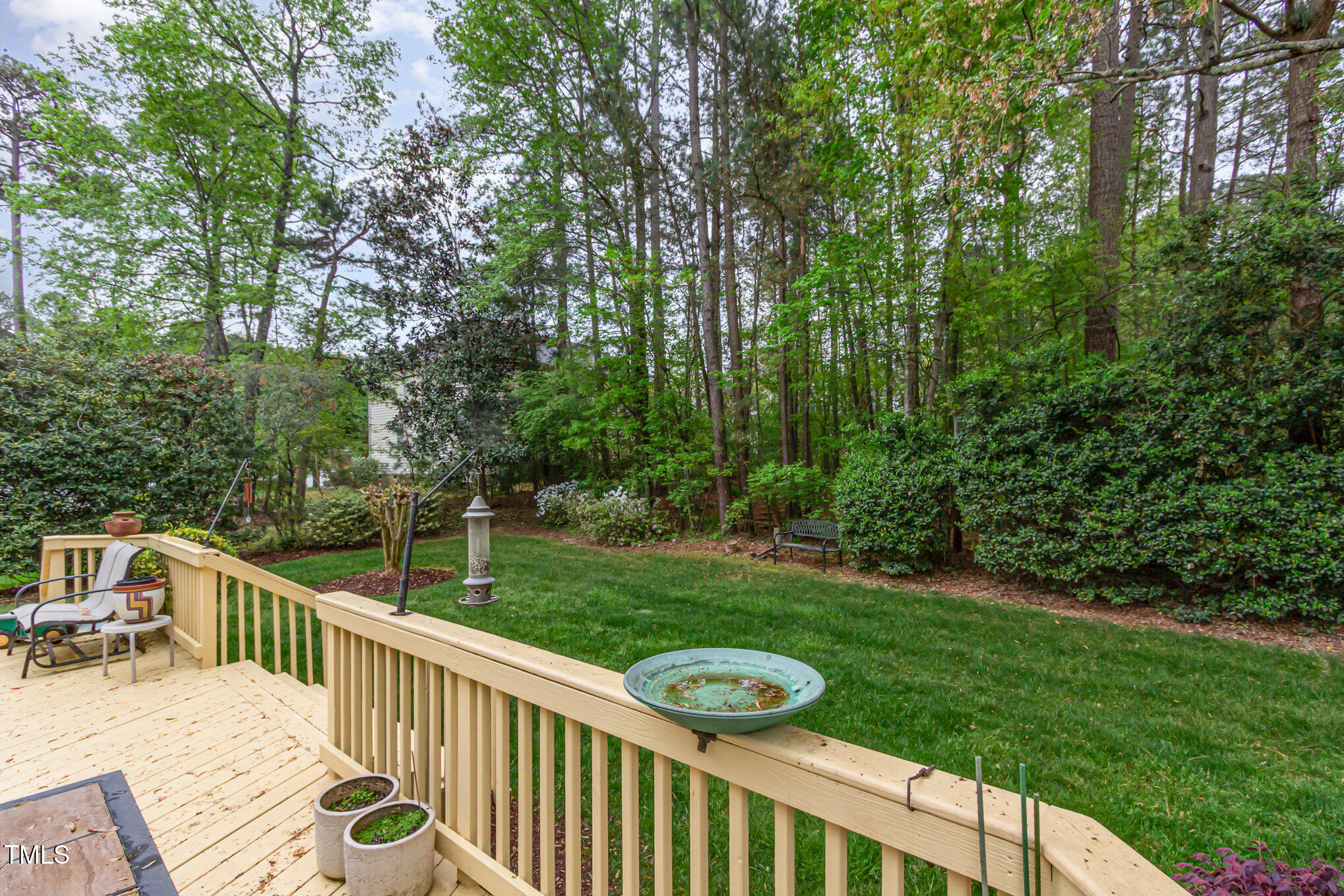 401 Stinhurst Drive Durham, NC 27713 - Photo 35 of 39 a view of a wooden deck and backyard