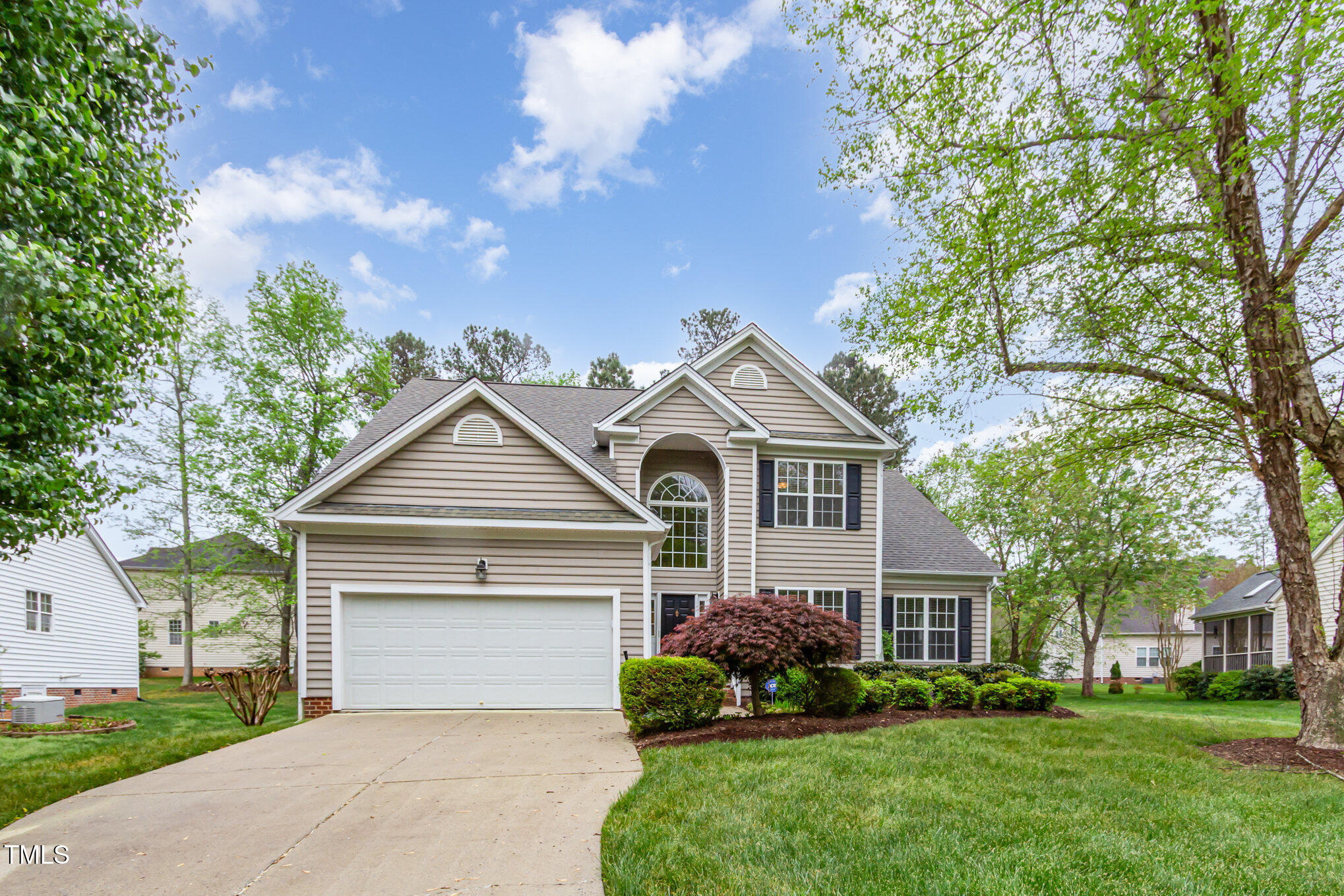 401 Stinhurst Drive Durham, NC 27713 - Photo 39 of 39 a front view of a house with a garden and trees