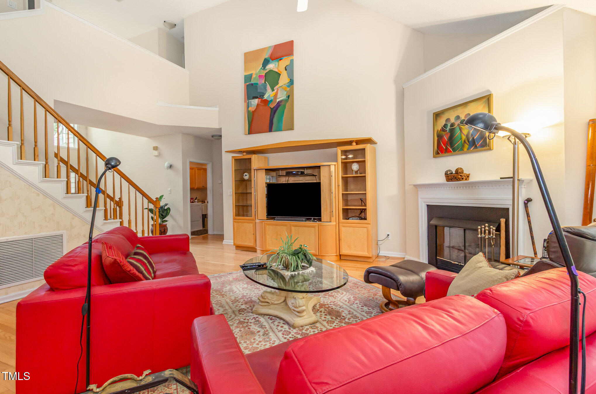 401 Stinhurst Drive Durham, NC 27713 - Photo 5 of 39 a living room with furniture and a fireplace
