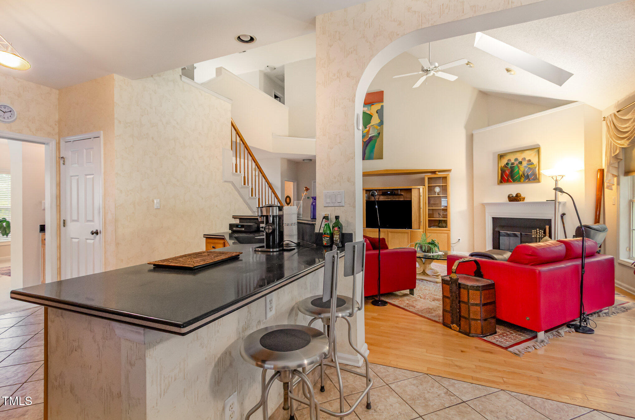 401 Stinhurst Drive Durham, NC 27713 - Photo 8 of 39 a living room with furniture fireplace and rug