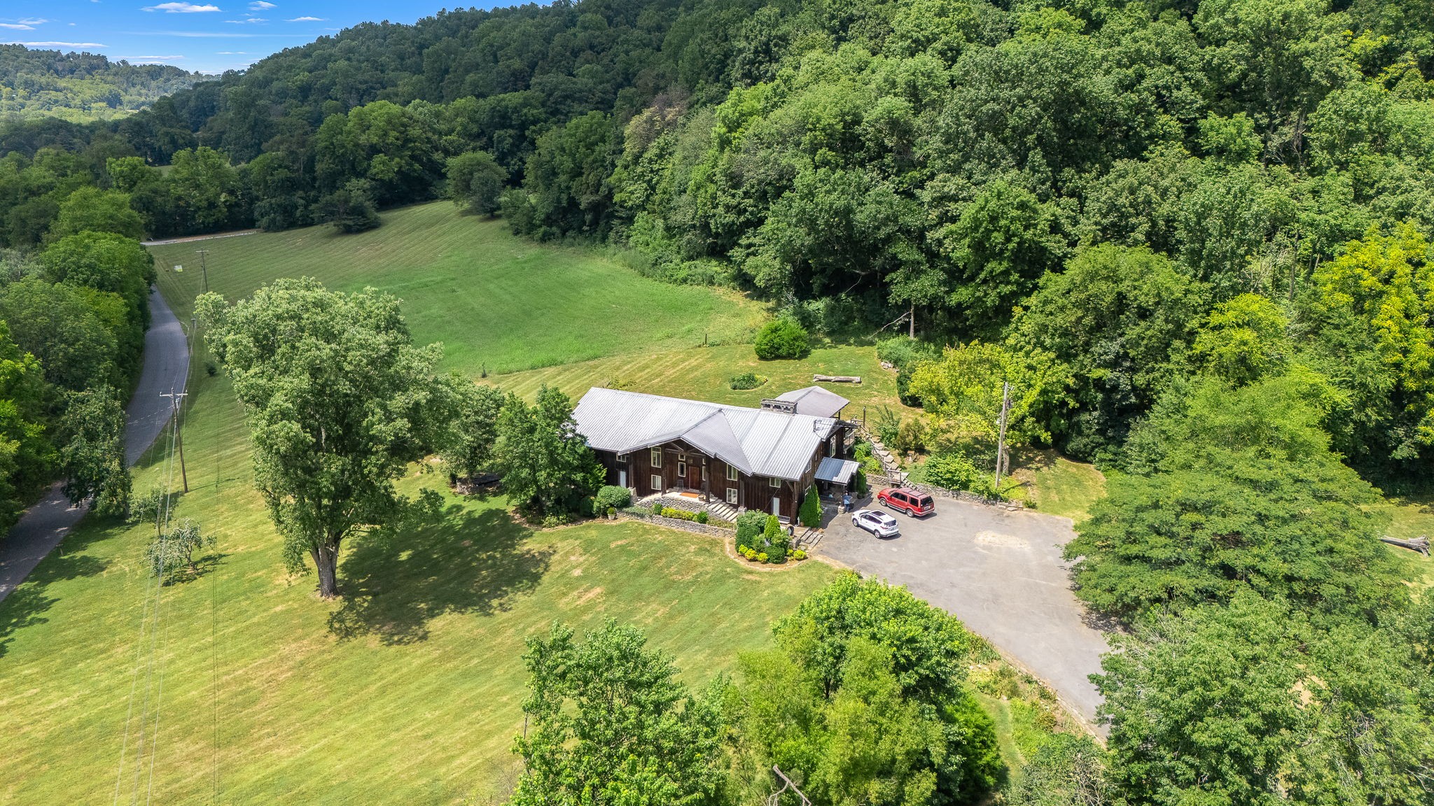 0 Cascade Hollow Road Normandy, TN 37360 - Photo 3 of 25 a view of a chair and fire pit in the middle of garden