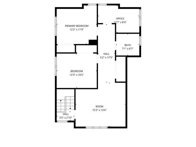 a picture of a bench in front of a wall