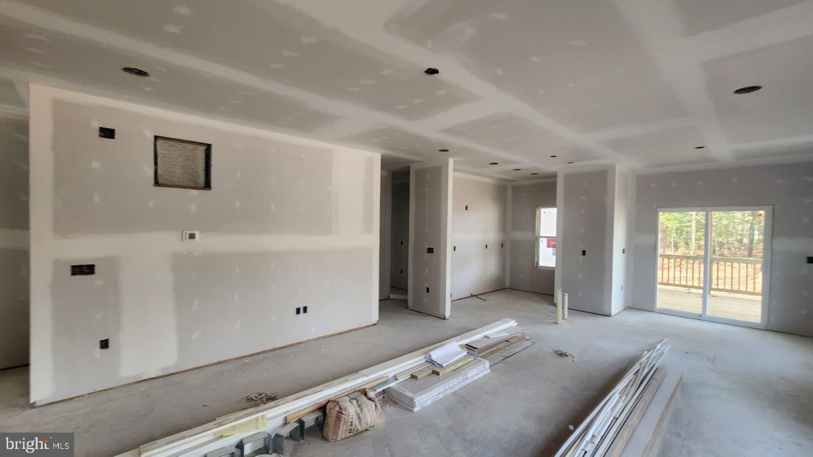 175 Rose Way Colonial Beach, VA 22443 - Photo 6 of 16 a spacious bedroom with a bed and a window