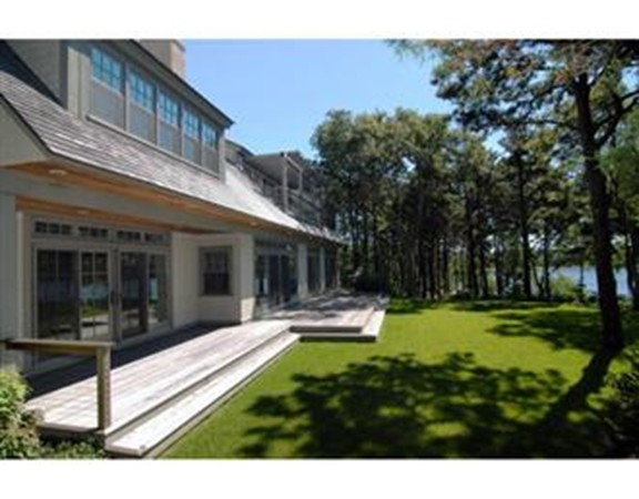 651 Old Post Road Barnstable, MA 02635 - Photo 19 of 22 a view of a house with backyard and sitting area