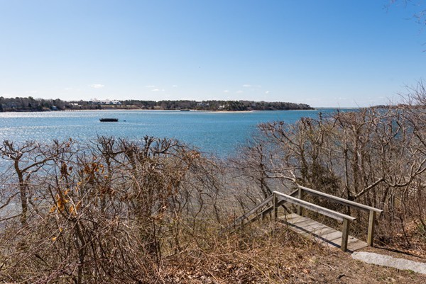651 Old Post Road Barnstable, MA 02635 - Photo 20 of 22 a view of lake with wooden stairs