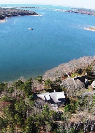651 Old Post Road Barnstable, MA 02635 - Photo 4 of 22 an aerial view of ocean with residential house and outdoor space