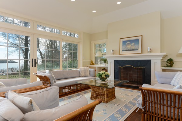 651 Old Post Road Barnstable, MA 02635 - Photo 8 of 22 a living room with furniture and a fireplace