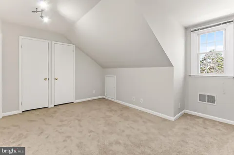 an empty room with a natural light