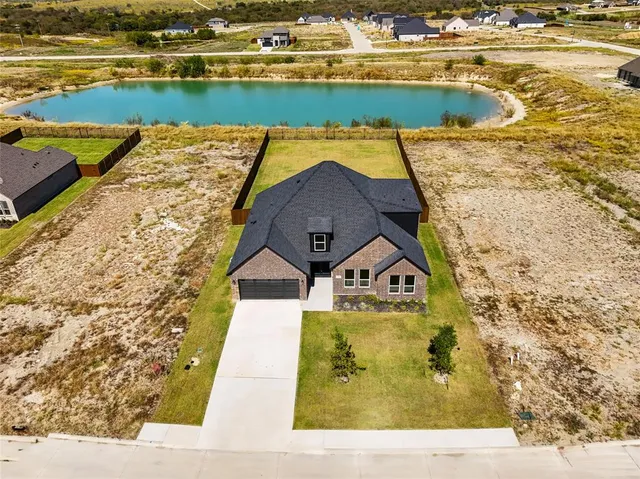 a view of swimming pool with a lake view