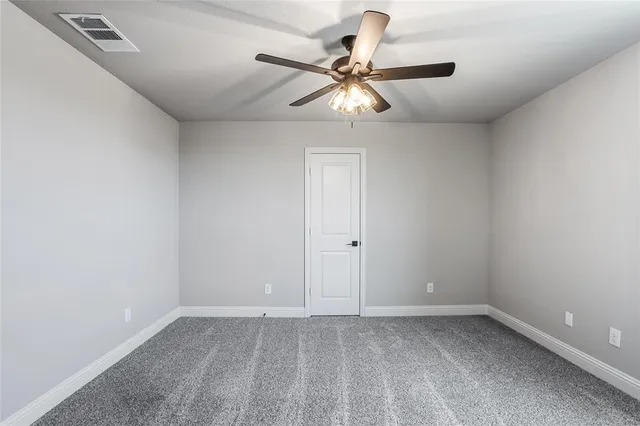 a bathroom with a sink toilet vanity and bathtub