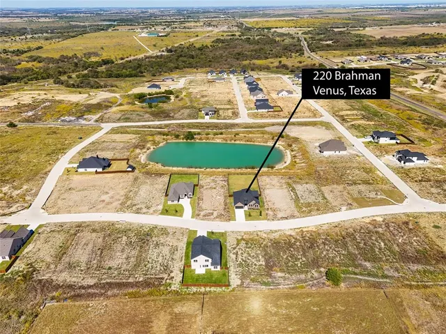 a view of an ocean with a houses