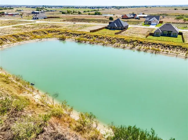 a view of a backyard and a house