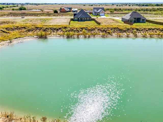 a view of swimming pool with an ocean view