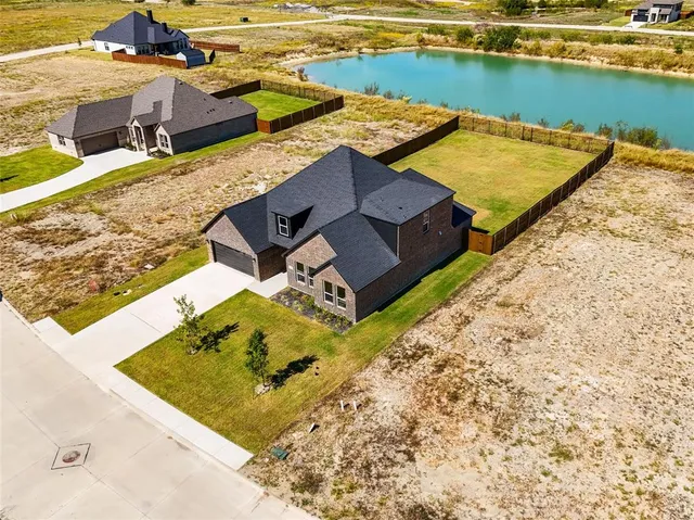 swimming pool with an outdoor seating and yard