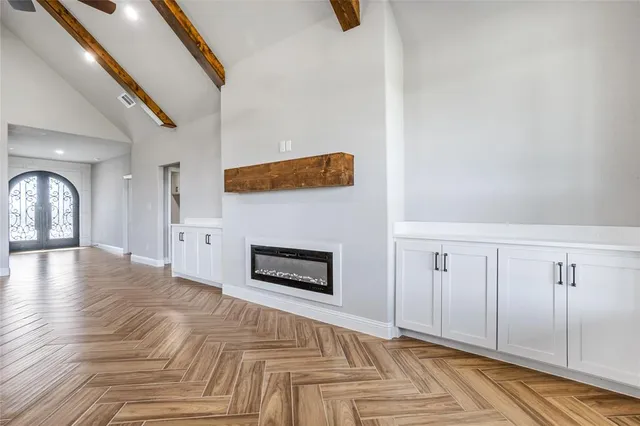 a view of a living room and kitchen