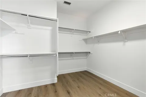 a view of an empty walk in closet