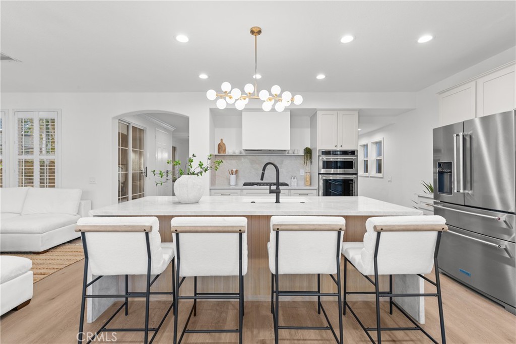 173 Parkside Drive Simi Valley, CA 93065 - Photo 3 of 31 a kitchen with stainless steel appliances a white stove top oven and refrigerator