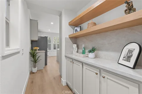 a view of living room with furniture and entryway