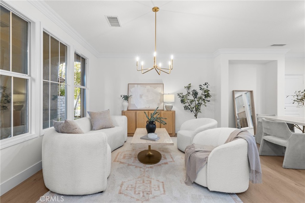 173 Parkside Drive Simi Valley, CA 93065 - Photo 9 of 31 a living room with furniture and a floor to ceiling window